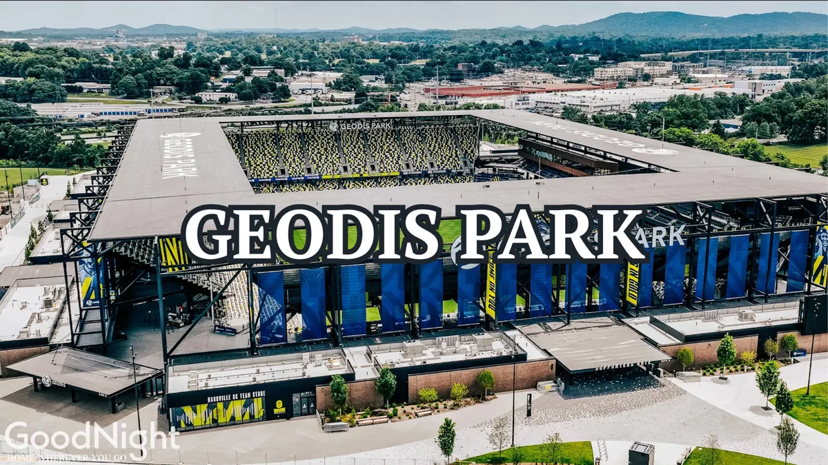 A vibrant exterior shot of GEODIS Park, with its recognizable signage and stadium architecture framed by trees and greenery. The energy of the stadium is palpable, promising exciting sporting events and community gatherings suitable for families and groups.